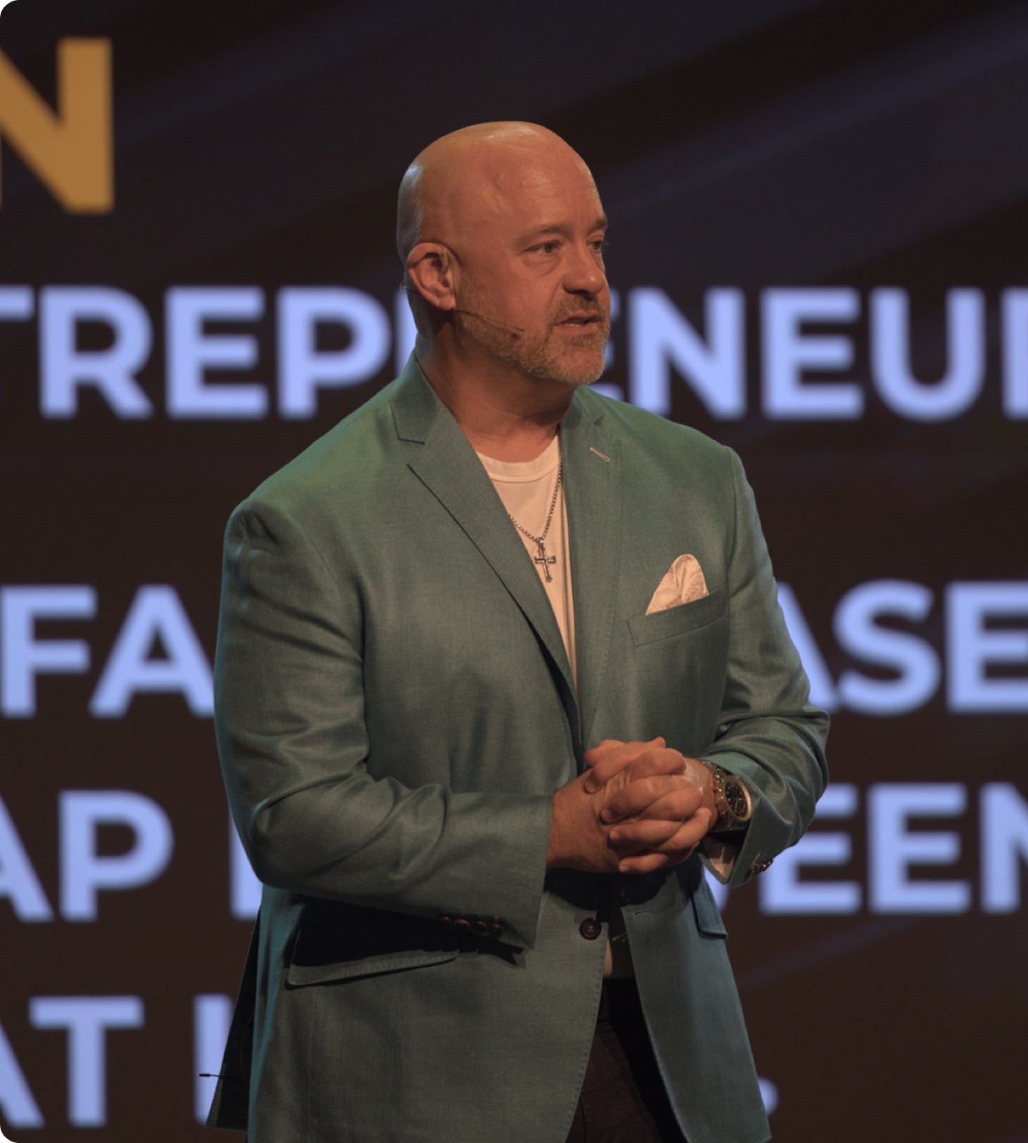 Ken Joslin speaking from the stage at a Grow Stack Drive event